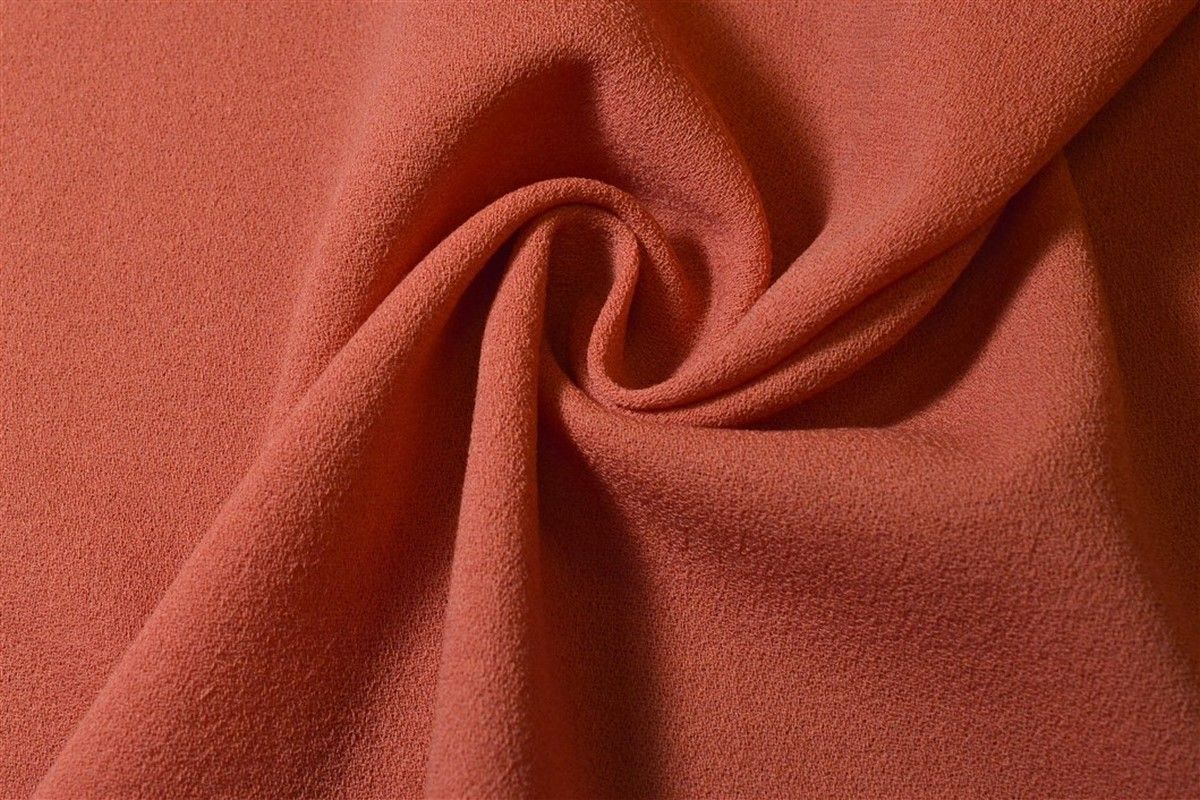 Приобрести Ткань костюмная, креповый цвета оранжевой пастели