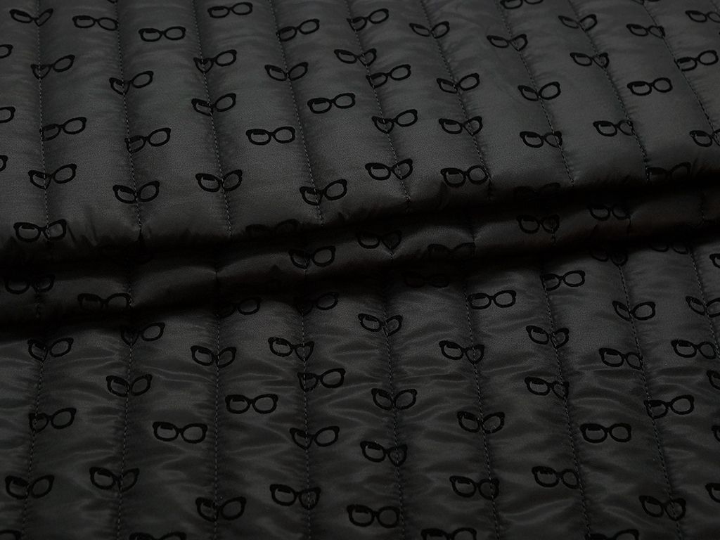 Курточная 2-х сторонняя стеганая ткань с рисунком очки, цвет черныйизображение