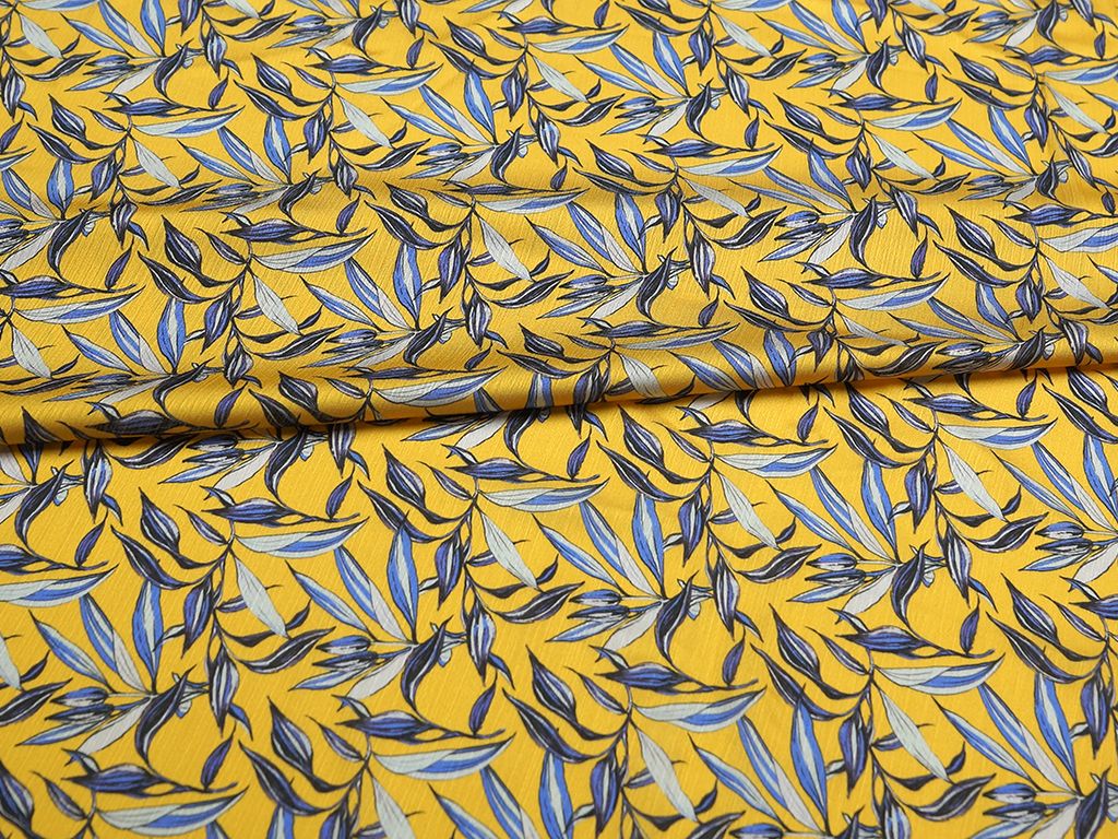 Приобрести Ткань блузочная с растительным принтом на желтом фоне