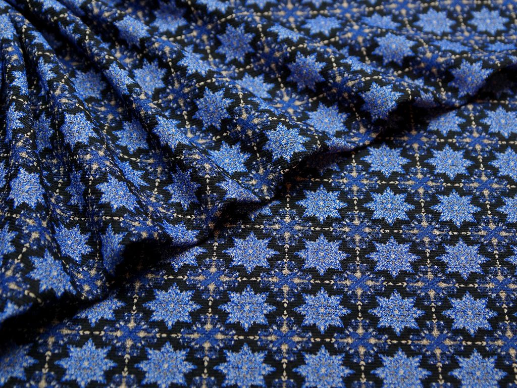 Ткань жаккард, цвет: на черном фоне голубые снежинкиизображение