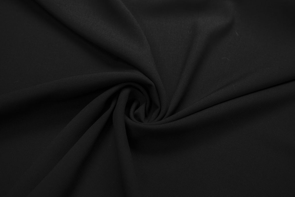 Костюмная ткань  с текстурной поверхностью, цвет черныйизображение