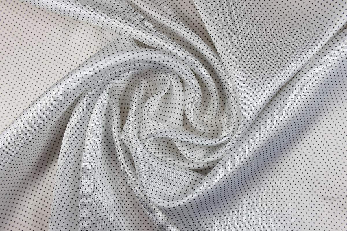 Ткань подкладочная, мелкий серый горошек на белом полеизображение