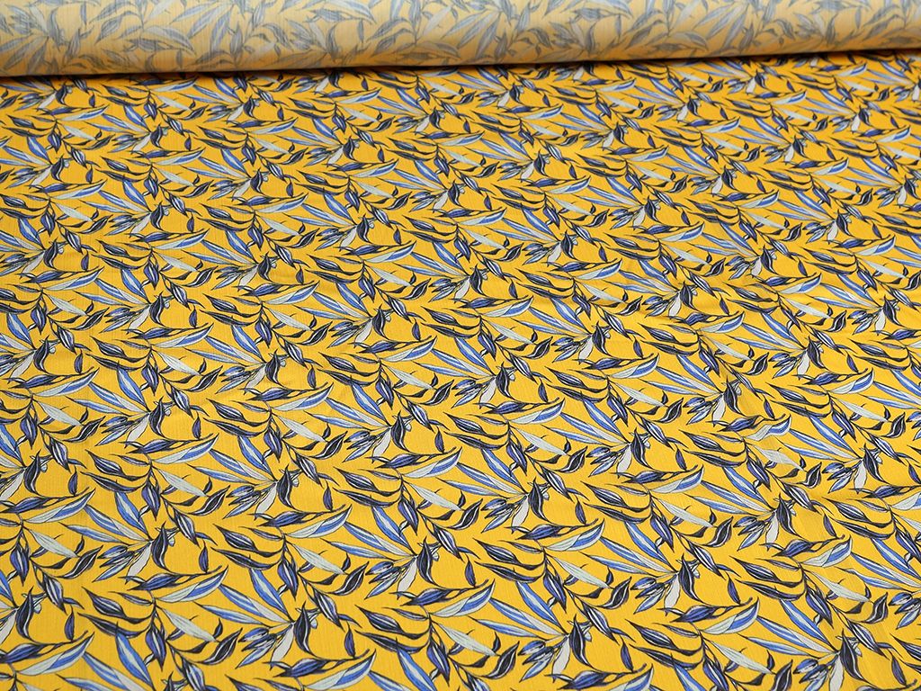 Приобрести Ткань блузочная с растительным принтом на желтом фоне