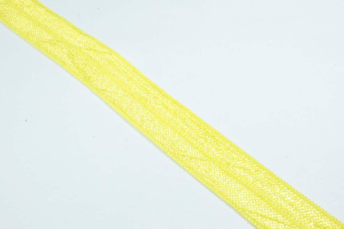 Косая бейка стрейч эластичная. Тонкая резинка для трикотажа. Трикотажная желтая тесьма. Желтая трикотажная лента резинка.