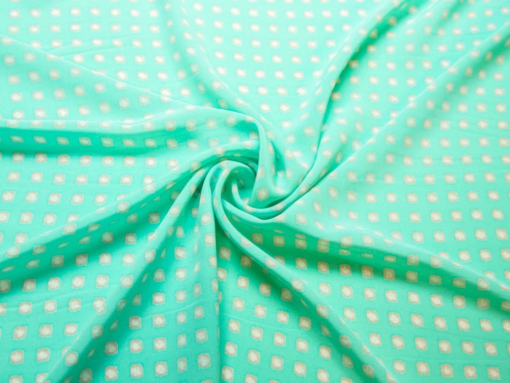 Блузочный шелк мятного цвета с геометрическим принтомизображение
