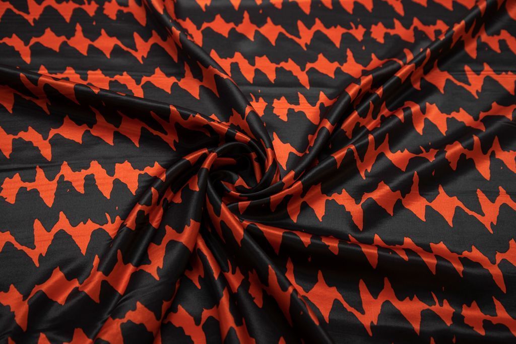 Блузочно-плательный шелк с рисунком "Огненный ритм", цвет черно-красныйизображение