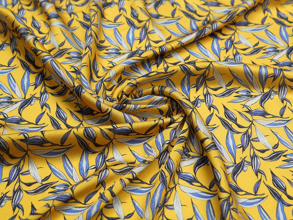 Ткань блузочная с растительным принтом на желтом фонеизображение