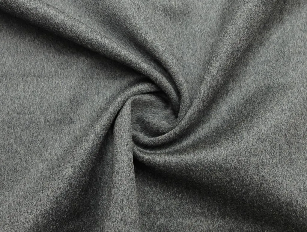 Дублированная пальтовая ткань, яркого серого цветаизображение