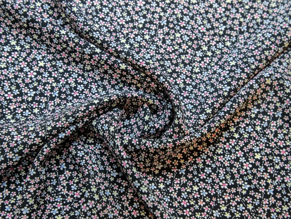 Приобрести Штапель с рисунком "Россыпь цветочков", фон черный ALIITA