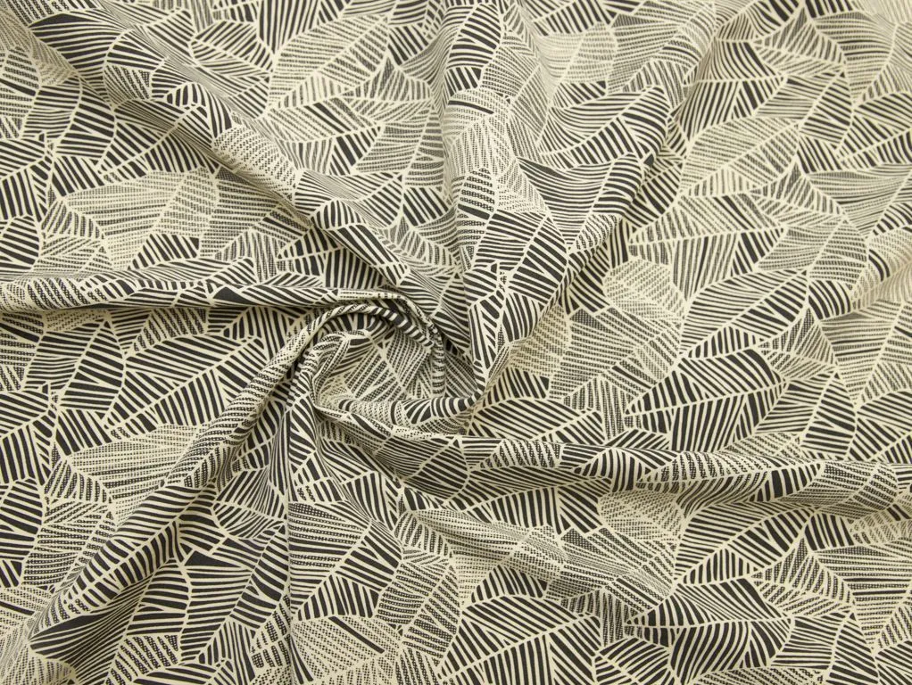 Костюмно-плательный хлопок бежево-черного цвета с растительным принтомизображение