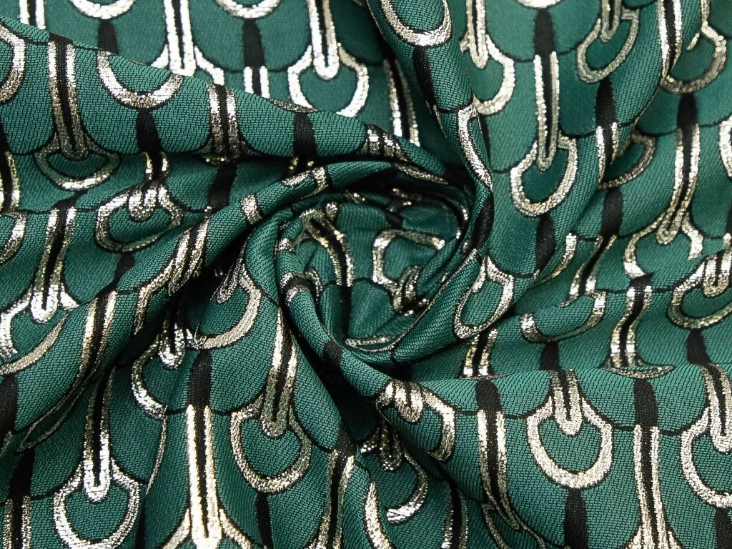 Жаккардовая ткань с серебристым шитьем на изумрудном фонеизображение